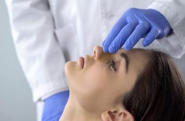 woman receiving rhinoplasty nose job treatment