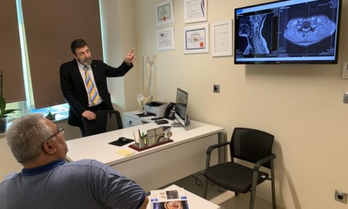 Doctor Salih Aydin is looking at x-ray images of a patient