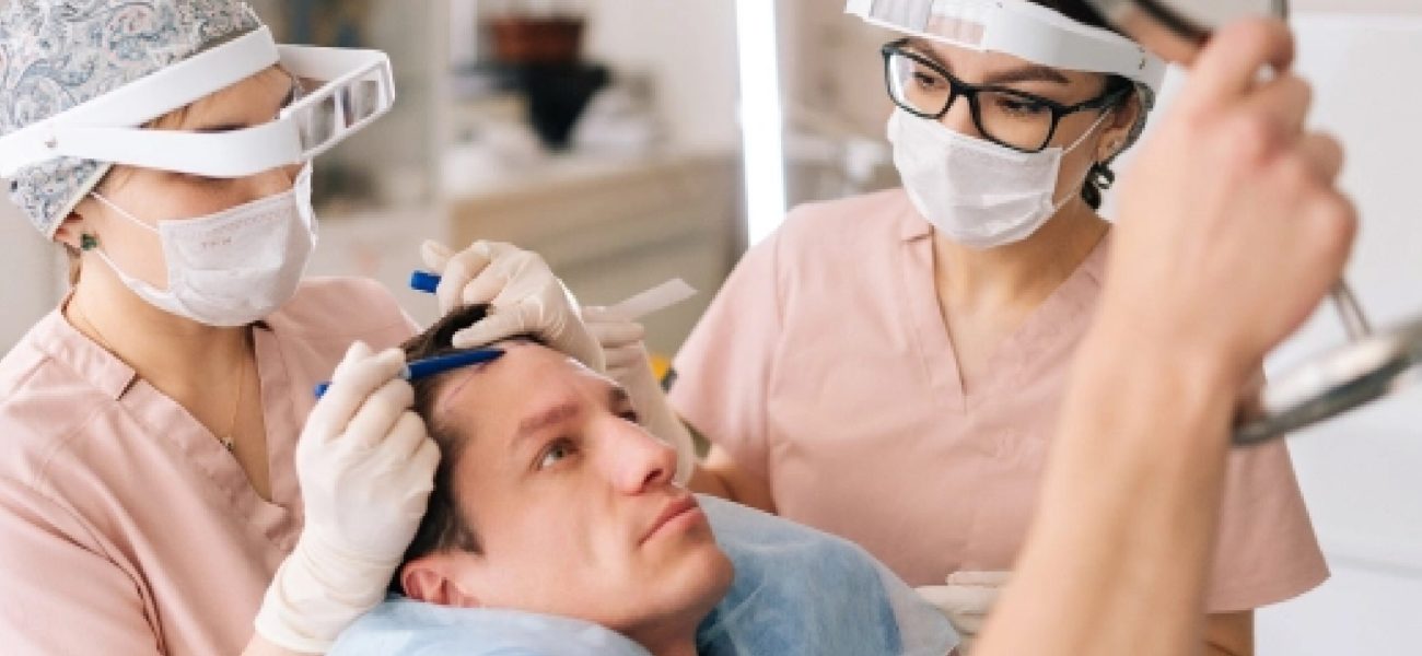 man in hair transplant clinic